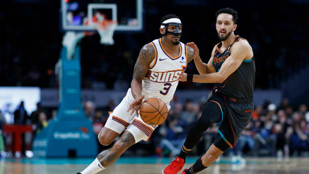 Phoenix Suns guard Bradley Beal (3) drives to the basket as Washington Wizards guard Landry Shamet (20) defends in the first half at Capital One Arena. Mandatory Credit: Geoff Burke-USA TODAY Sports
